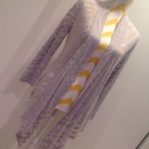 Grey semi-sheer open front top.