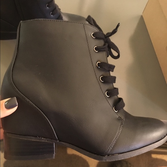 Black bootie w/ small built in heel.