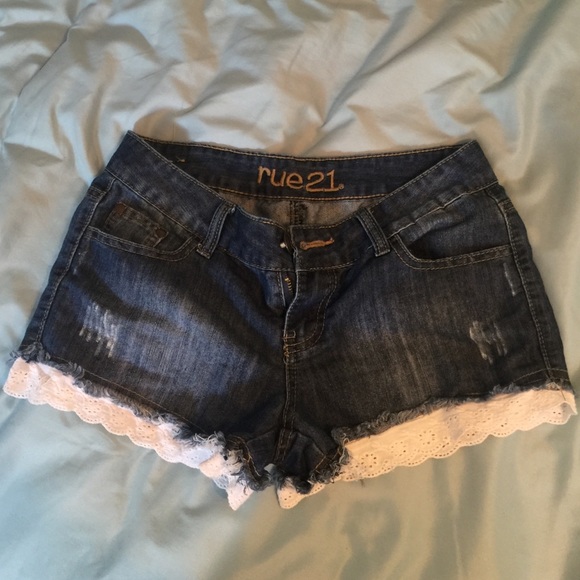 Blue jean shorts with white ruffles