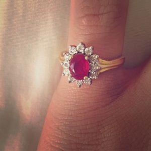 Ruby with with 10k gold band and diamond accents