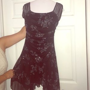 Black cocktail dress with silver flowers