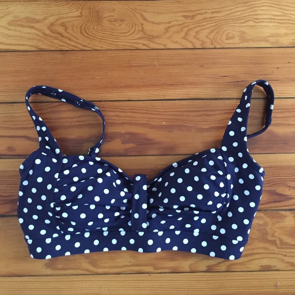 Navy and white polka dot swim top