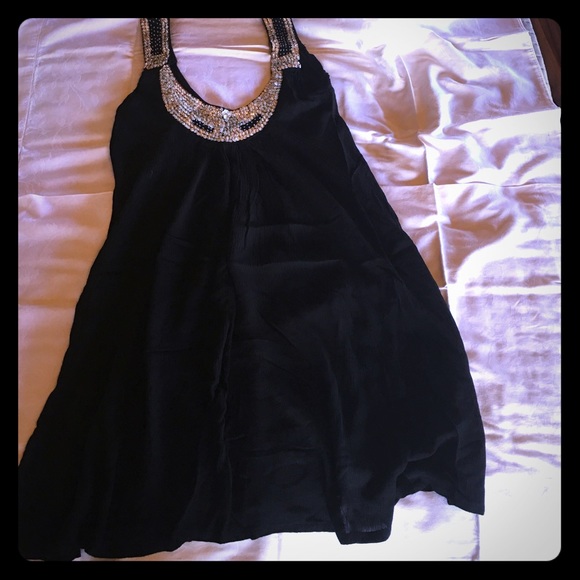 Black dress or beach cover up with sequins!