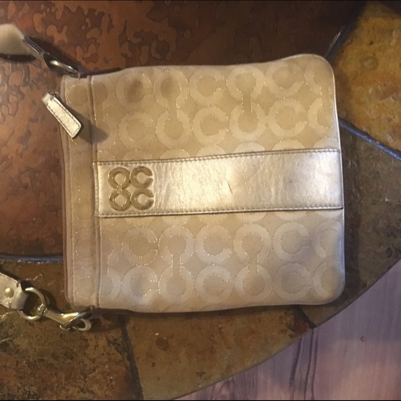 Gold coach cross body bag