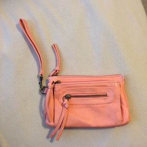 Peach faux leather wristlet