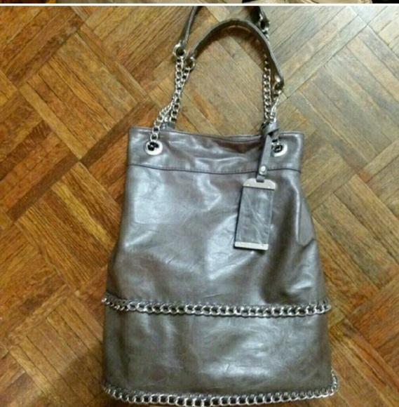 Large brown bucket purse.