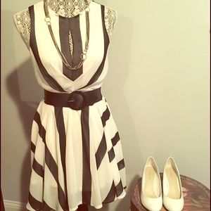 Black and white sleeveless cocktail dress.