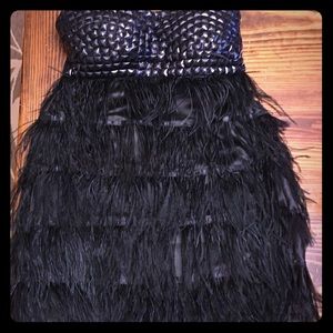 Fabulous black feather mini with crystal bodice.
