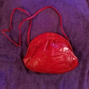 Red patchwork leather crossbody bag.