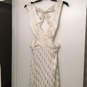 Romantic and chic freepeople dress with cut outs.