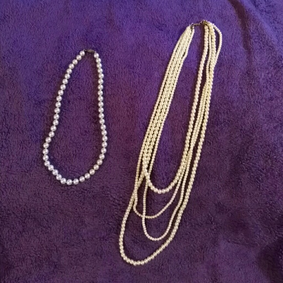 Faux pearl necklace duo.