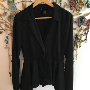 Black peplum blazer.