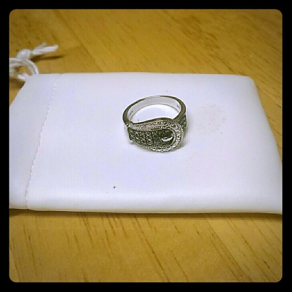 Ring  chocolate diamonds in buckle setting