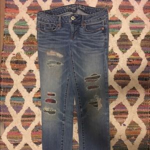 American Eagle patched jeans.