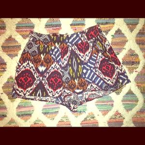 High waisted cloth shorts with a tribal pattern.