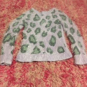 Girls use furry sweater