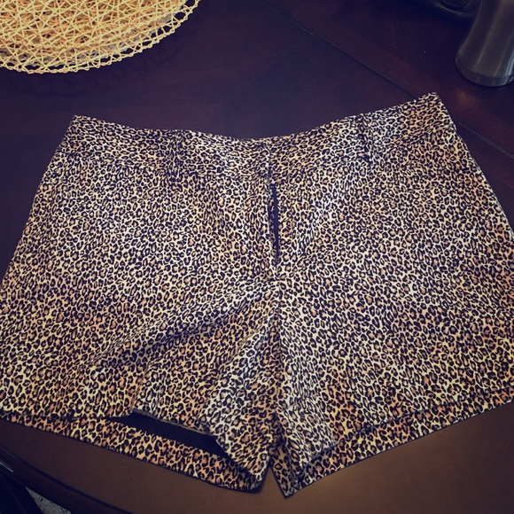 White House Black Market Pants - White and black leopard print short.