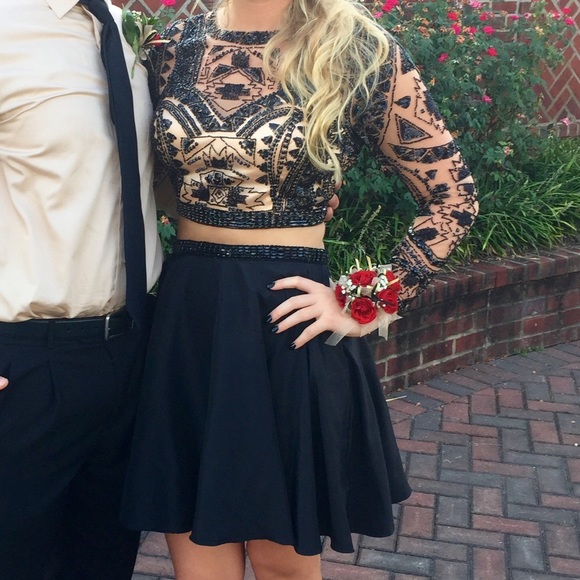 Long sleeve black and nude homecoming dress