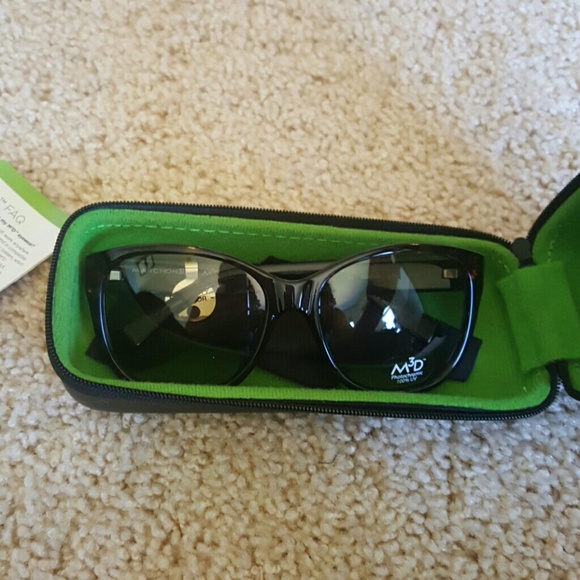 Marchon sunglasses tortoise color with case