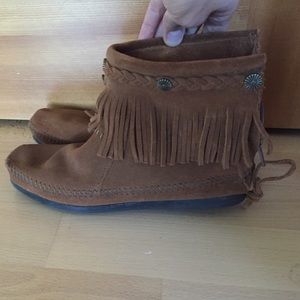 Minnetonka moccasins. Super cute fringe!!