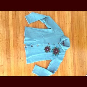 Boden cardi with flower appliqué.