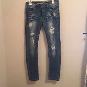 Distressed destroyed skinny jeans