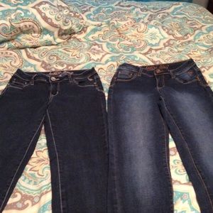 Pair of GIRLS EUC Justice skinny jeans