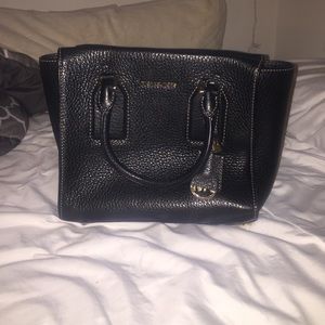 Black, leather Michael Kors purse.