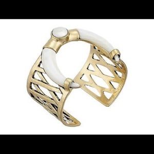 Lucky cuff. Lattice. Gold. Tusk. Horn.