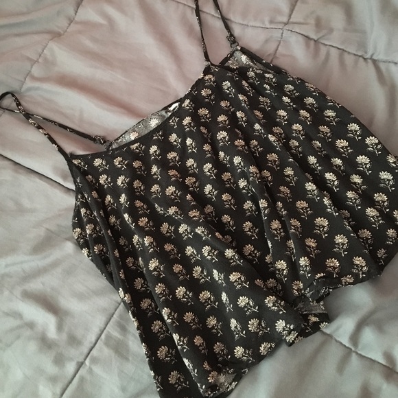 black and cream tank top with flowers on it