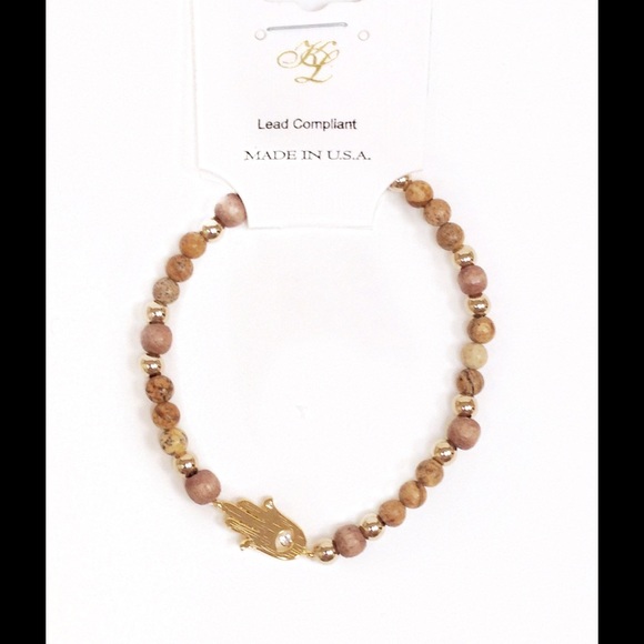 Stretch beads bracelet with gold lucky hand