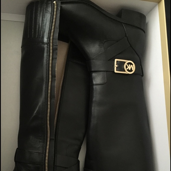 Michael kors boots worn once!