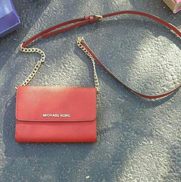 Michael kors  side purse. Gold and red. Never used