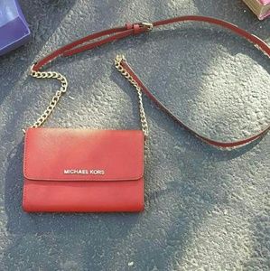 Michael kors  side purse. Gold and red. Never used