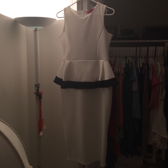 Black and white peplum midi dress.
