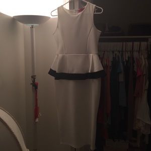 Black and white peplum midi dress.