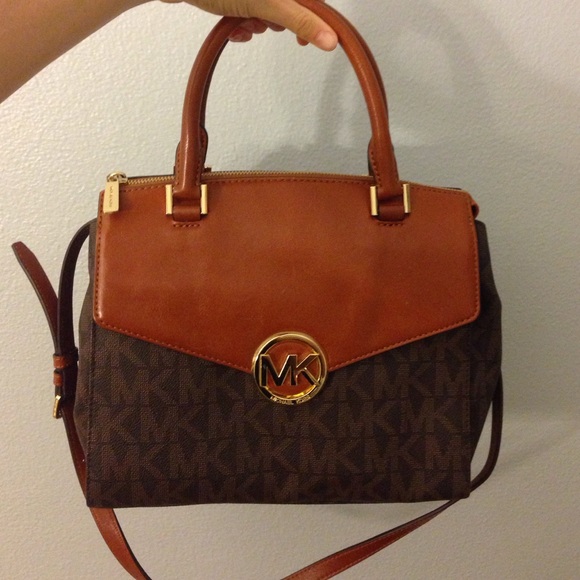 Michael Kors handbag with cross body strap.