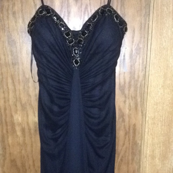 Long black and gold prom dress