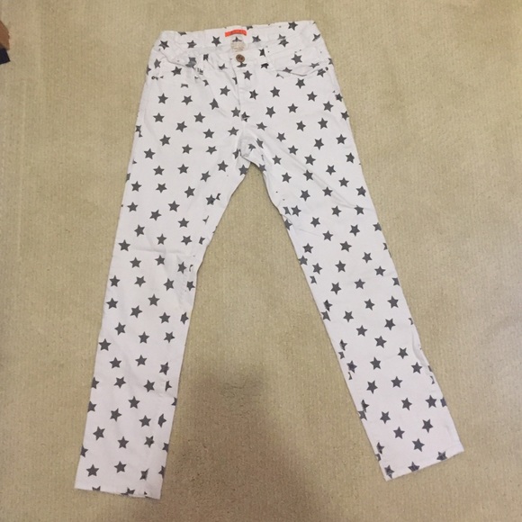 white jeans with stars