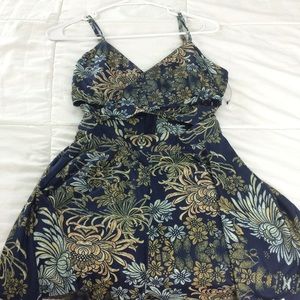 AKIRA Jungle Floral Romper with front cutout
