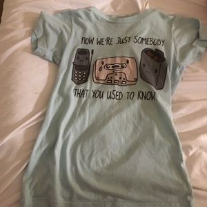 A light blue tee shirt