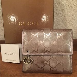 Gucci ladies canvas trifold wallet