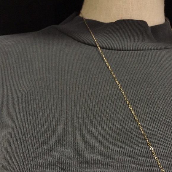 Ribbed high neck with a flowy body top - Picture 3 of 3