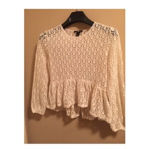 See-thru white peplum top