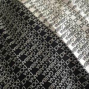 VINTAGE DOLCE and Gabbana black and white scarf.
