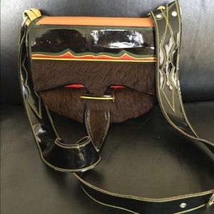 Patent fur and leather crossbody bag
