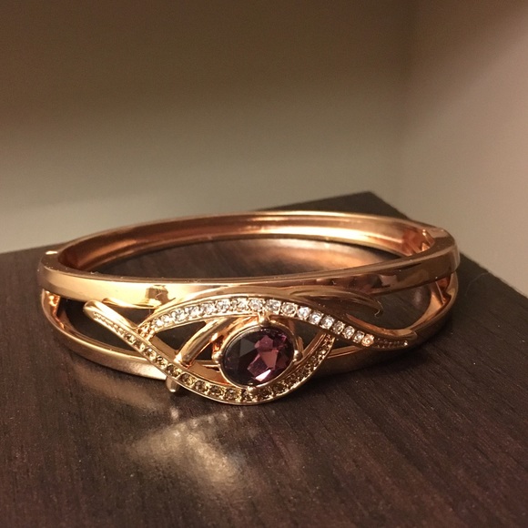 Avon Jewelry - SOLD: NEW Avon chocolate cuff