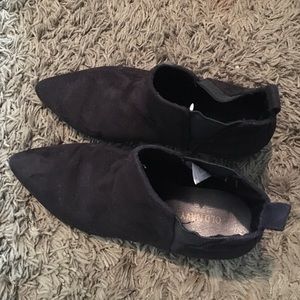 Black suede ankle boots.