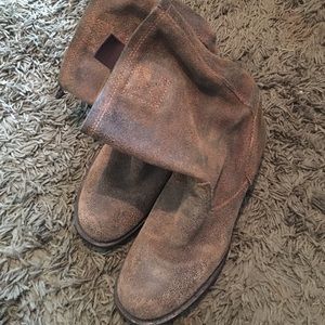 Distressed suede boots.