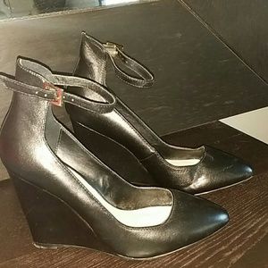 Stylish ankle strap black leather wedges